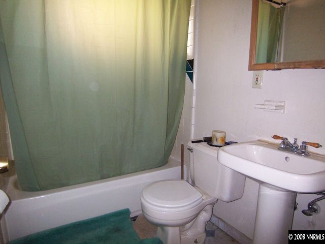 1620 Trainer Way Reno, NV 89512 - Photo 8 of 9 a bathroom with a sink and toilet