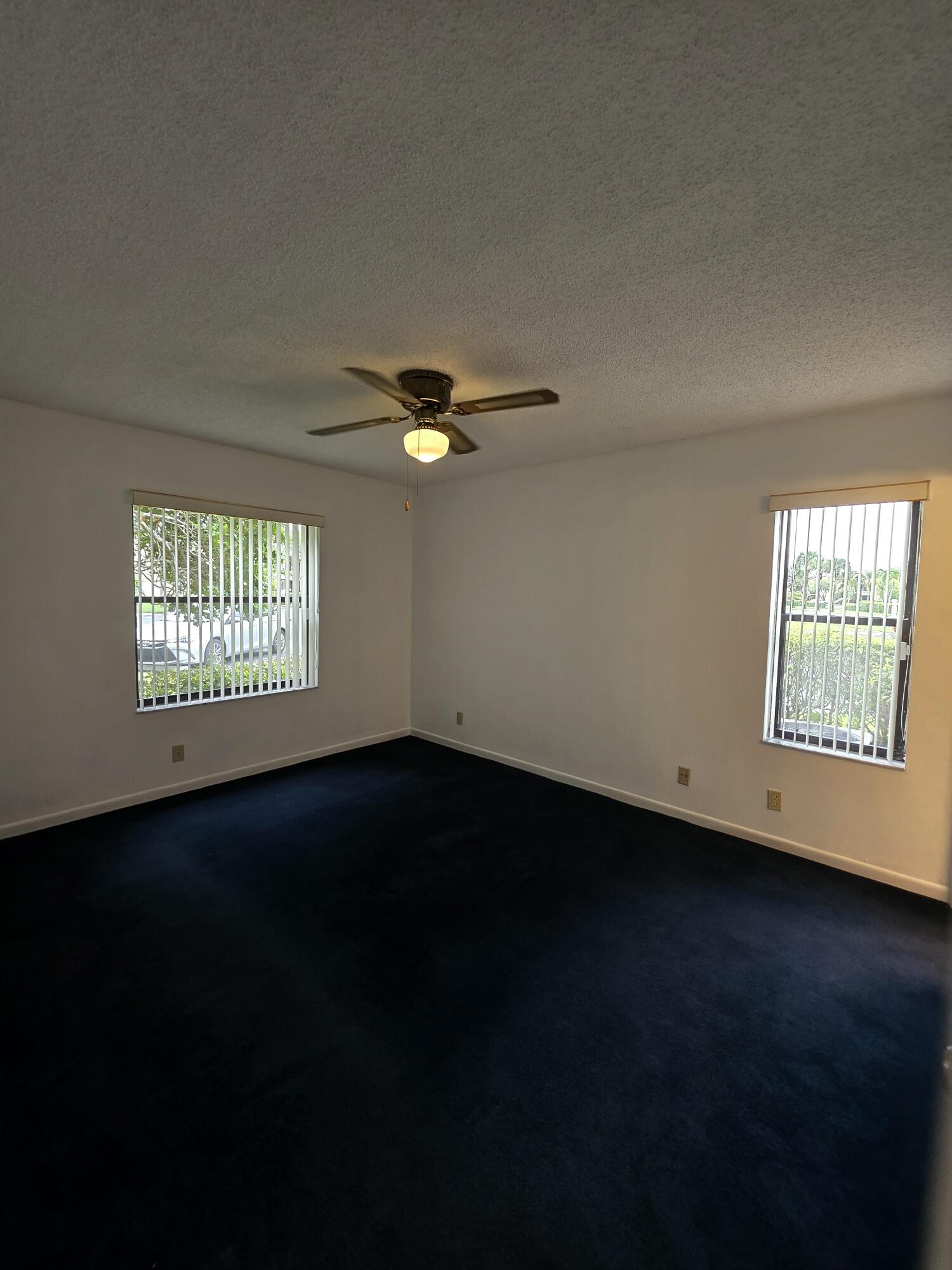 4709 Lucerne Lakes Boulevard East, Unit 101 Lake Worth, FL 33467 - Photo 11 of 18 Guest Room