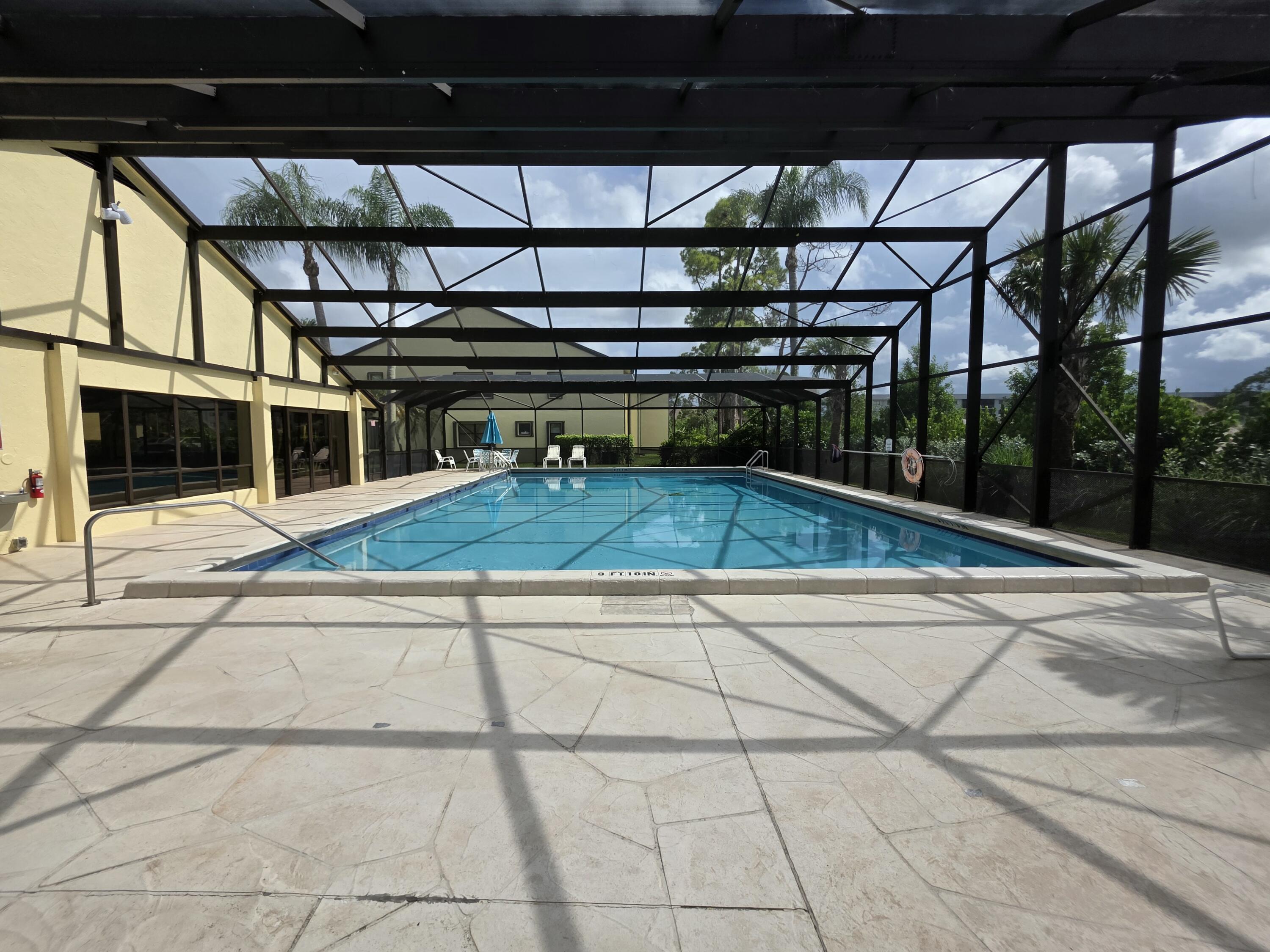 4709 Lucerne Lakes Boulevard East, Unit 101 Lake Worth, FL 33467 - Photo 15 of 18 Pool