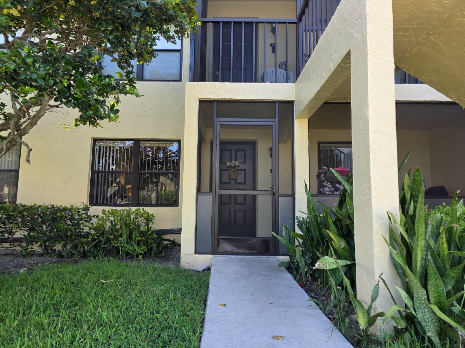4709 Lucerne Lakes Boulevard East, Unit 101 Lake Worth, FL 33467 - Photo 2 of 18 Front of the apartment