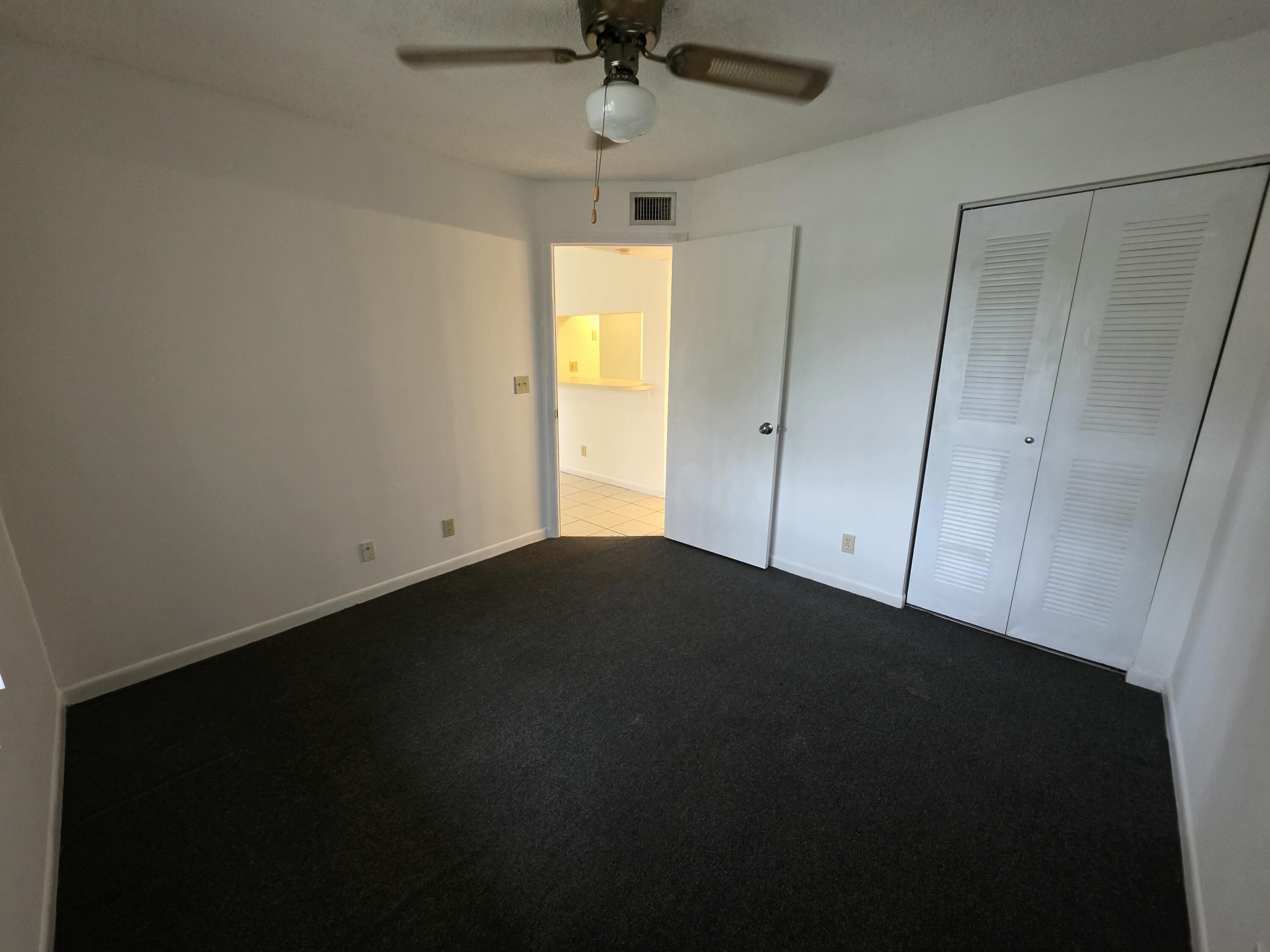 4709 Lucerne Lakes Boulevard East, Unit 101 Lake Worth, FL 33467 - Photo 9 of 18 Guest Room