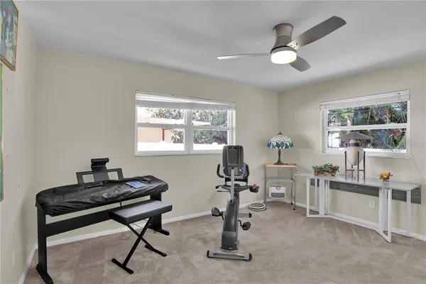 a view of a workspace with furniture