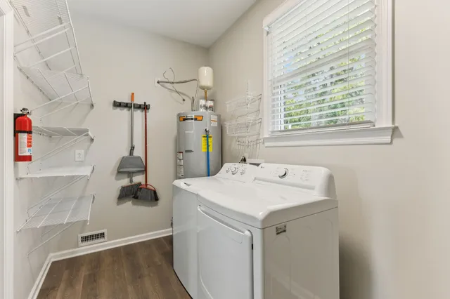 a utility room with dryer and washer