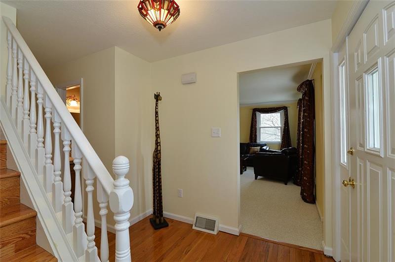 12 Lockwood Road Baden, PA 15005 - Photo 14 of 25 Entryway with REAL OAK HARDWOOD Flooring that wraps through the MAIN and goes up to 2nd story.