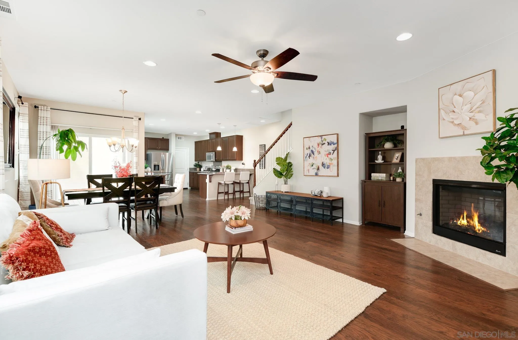 1767 Ragtime Way Oceanside, CA 92054 - Photo 1 of 28 a living room with furniture and a fireplace