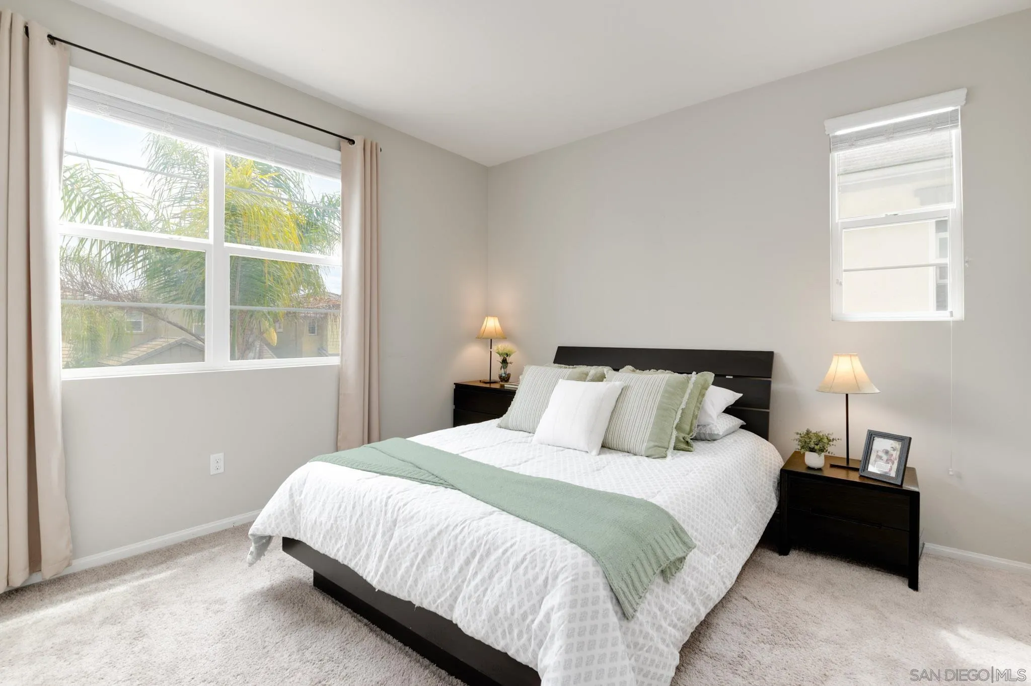 1767 Ragtime Way Oceanside, CA 92054 - Photo 16 of 28 a bedroom with a bed and a window