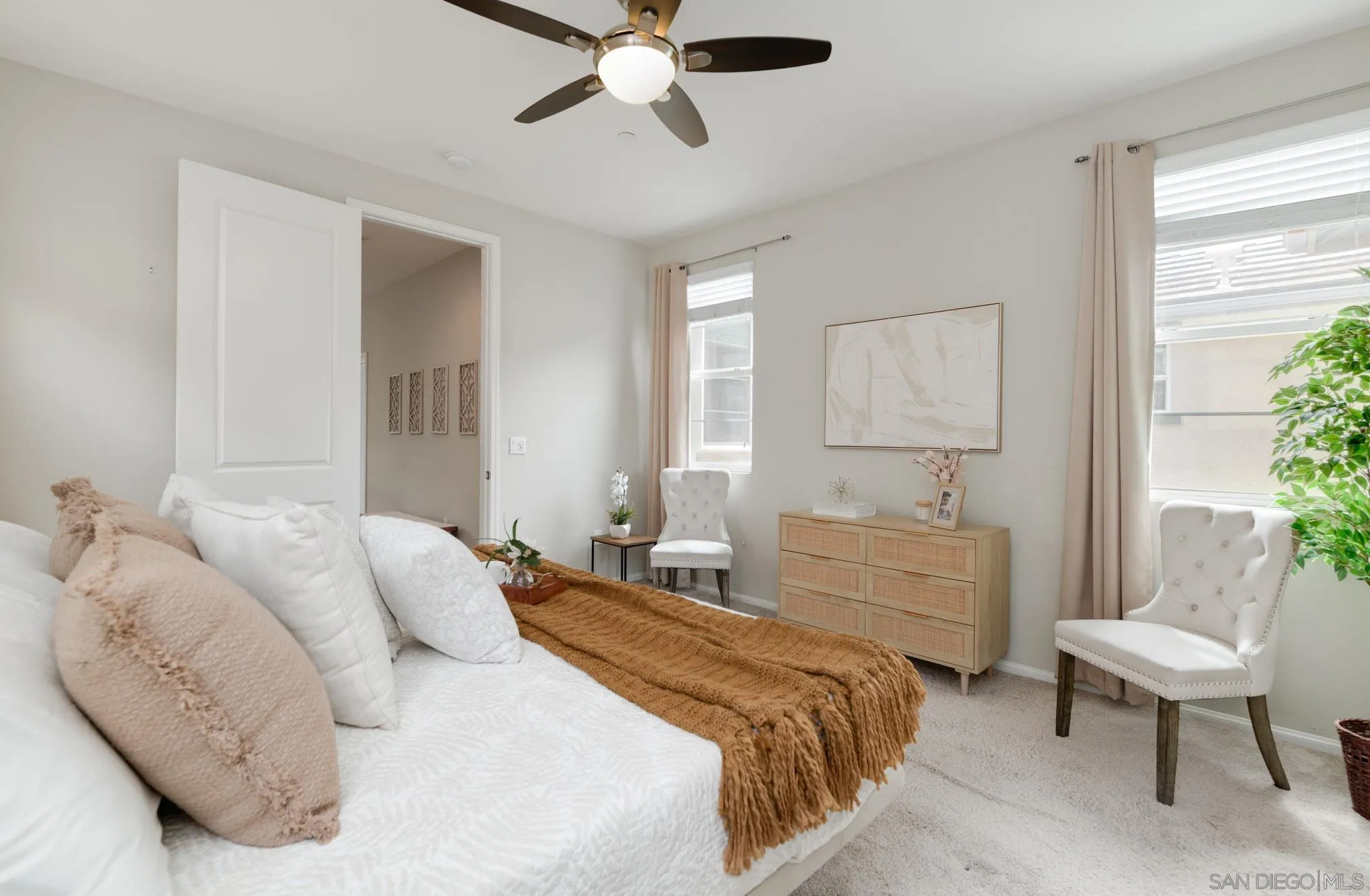 1767 Ragtime Way Oceanside, CA 92054 - Photo 20 of 28 a bedroom with a bed and a chair