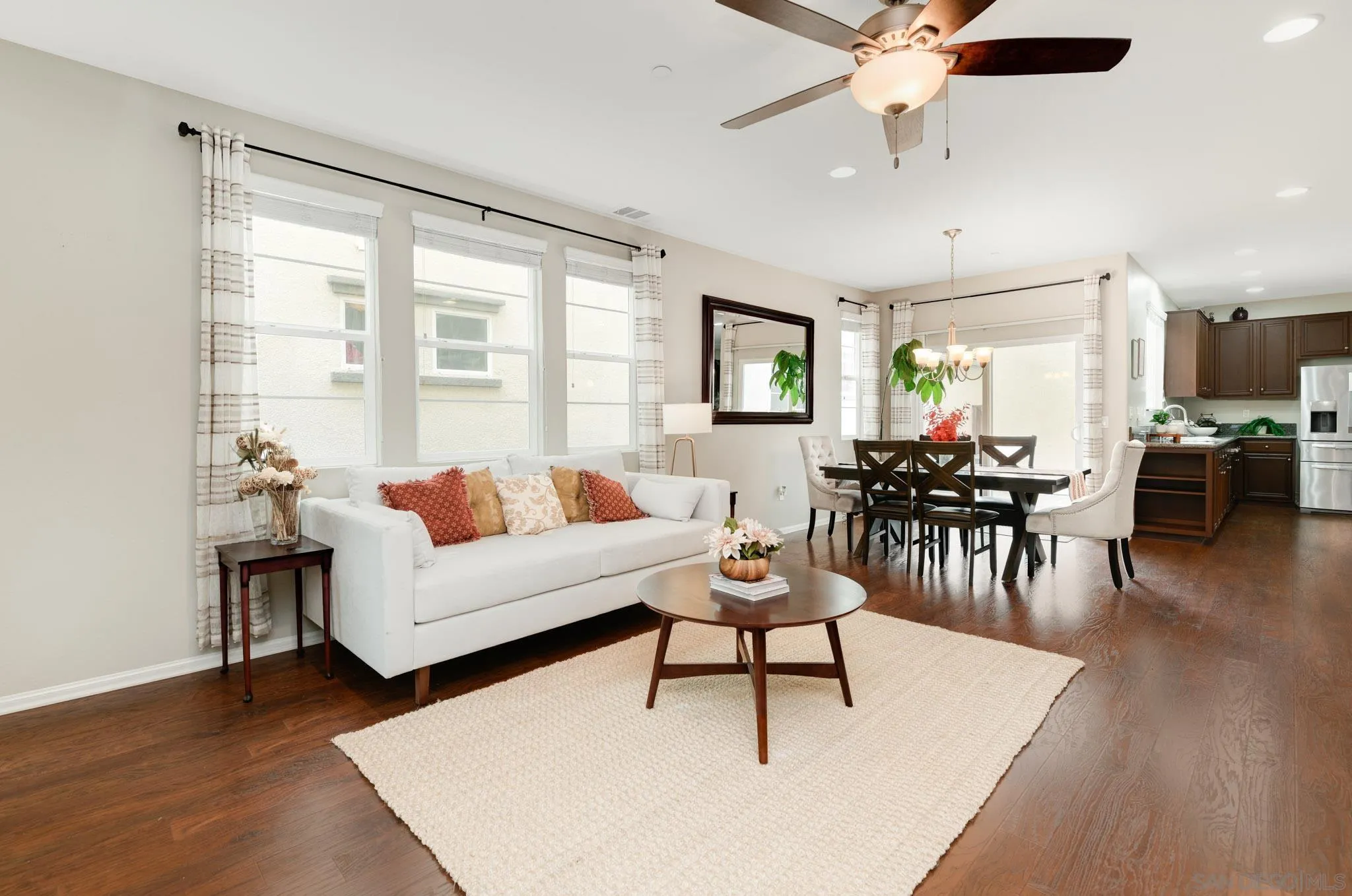 1767 Ragtime Way Oceanside, CA 92054 - Photo 3 of 28 a living room with furniture and wooden floor