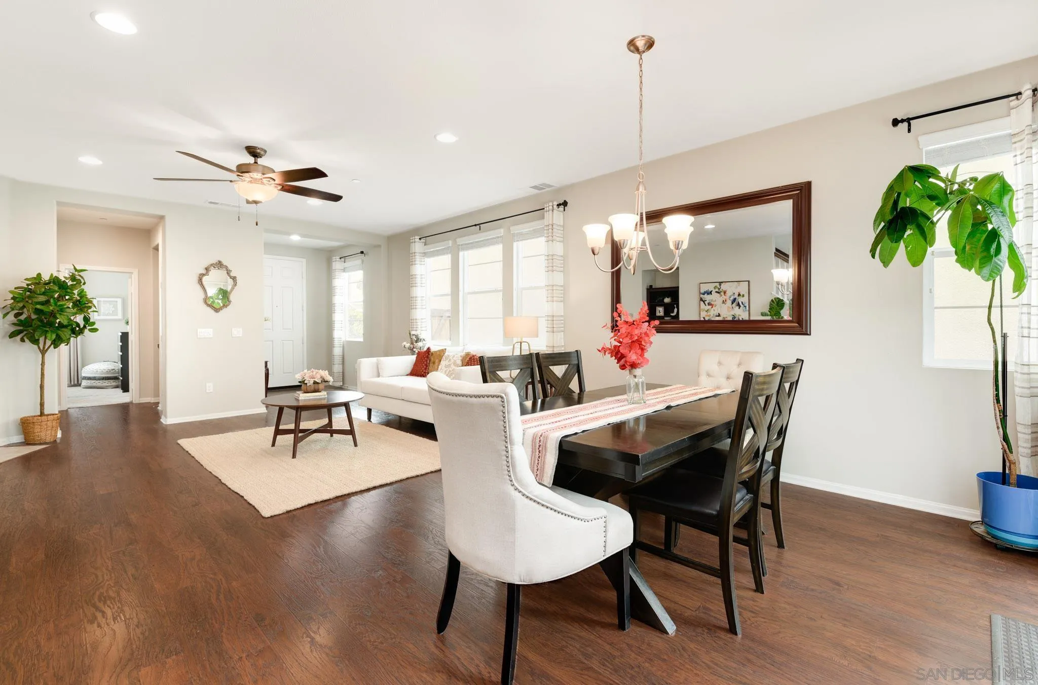 1767 Ragtime Way Oceanside, CA 92054 - Photo 6 of 28 a view of a dining room with furniture window and wooden floor
