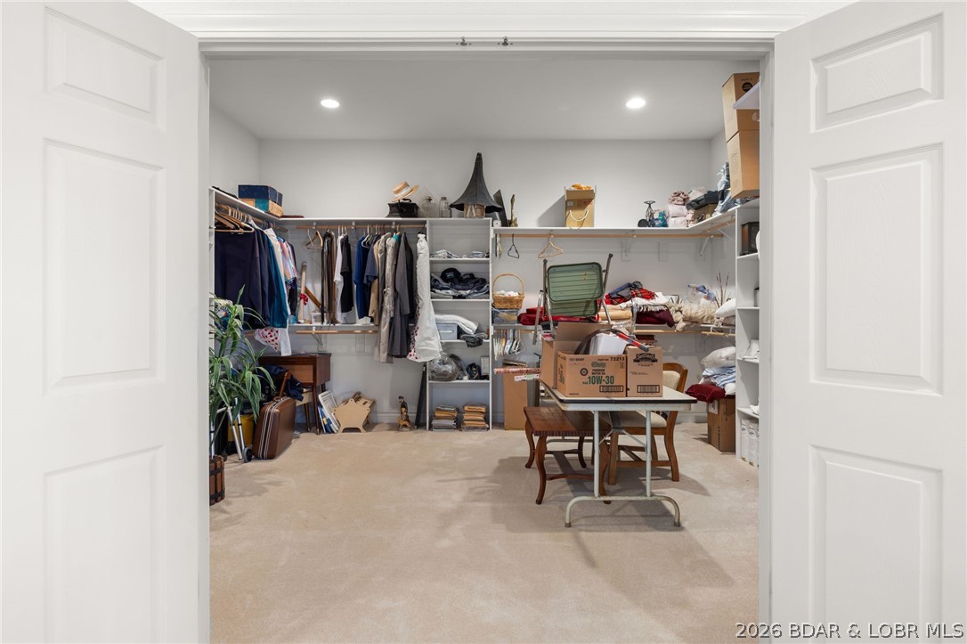 1386 Nichols Road Osage Beach, MO 65065 - Photo 22 of 62 Master suite walk in closet is accessed by double
