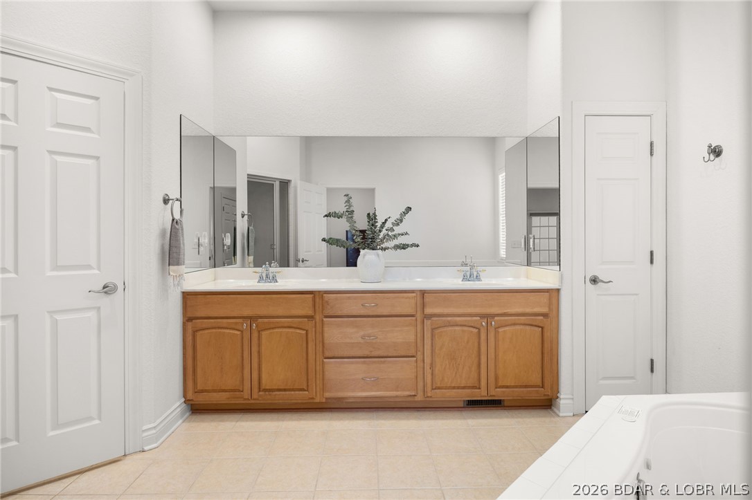 1386 Nichols Road Osage Beach, MO 65065 - Photo 25 of 62 Master suite