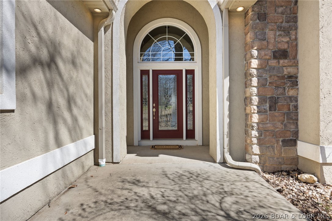 1386 Nichols Road Osage Beach, MO 65065 - Photo 3 of 62 Covered front entrance
