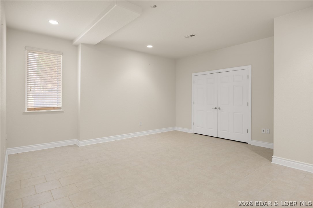 1386 Nichols Road Osage Beach, MO 65065 - Photo 41 of 62 4th bedroom located in the lower level walk out