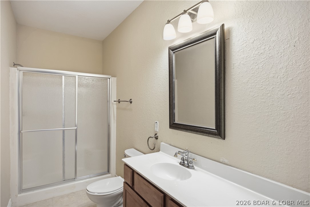 1386 Nichols Road Osage Beach, MO 65065 - Photo 43 of 62 3rd bathroom located in the walkout lower level