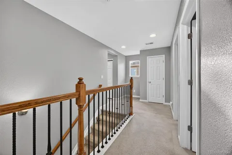 a view of a hallway with closet
