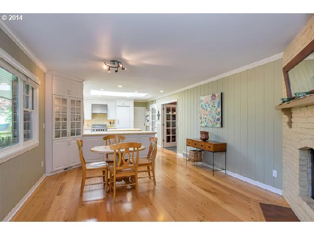 3700 Southwest 48th Place Portland, OR 97221 - Photo 3 of 16 a view of a dining room with furniture and wooden floor