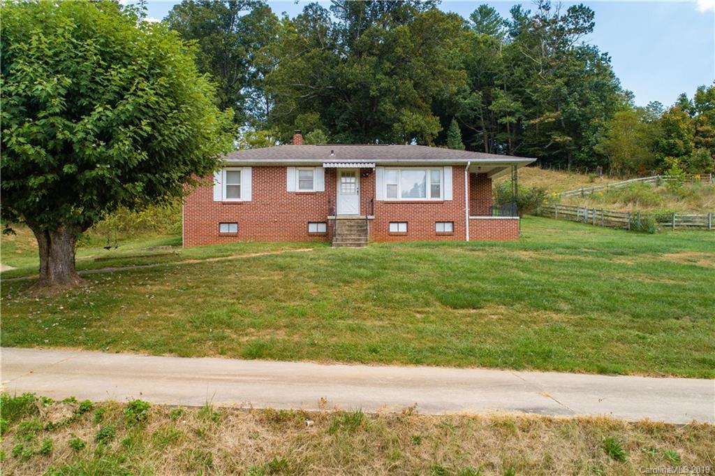 8617 Cruso Road Canton, NC 28716 - Photo 11 of 30 a view of a house with a yard