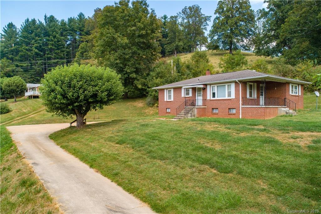 8617 Cruso Road Canton, NC 28716 - Photo 13 of 30 a front view of house with yard and green space