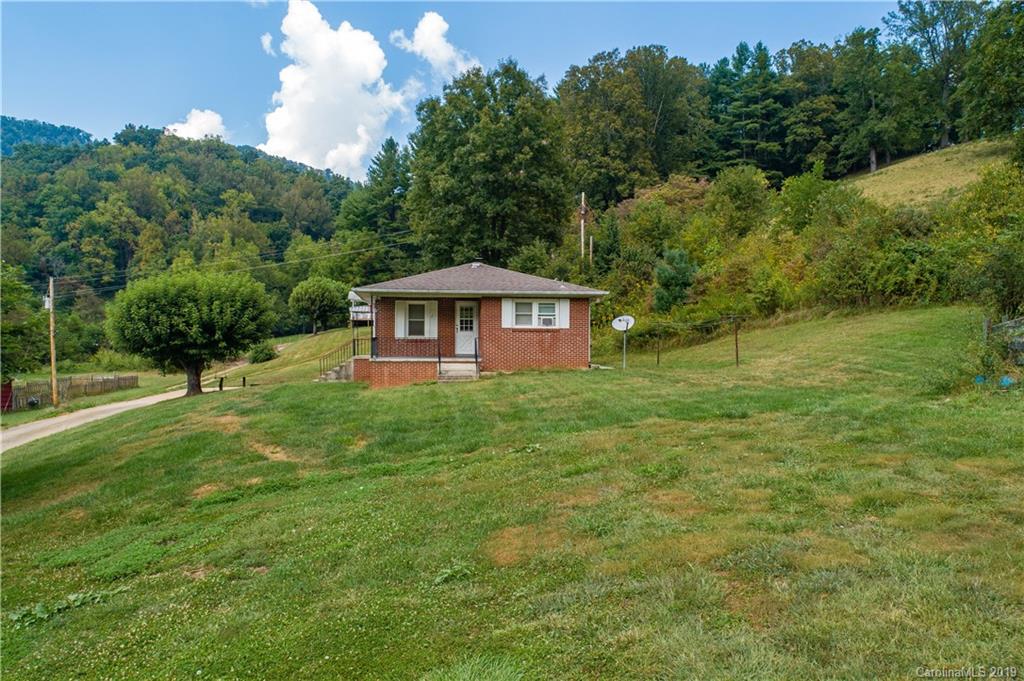 8617 Cruso Road Canton, NC 28716 - Photo 15 of 30 a view of a house with a yard