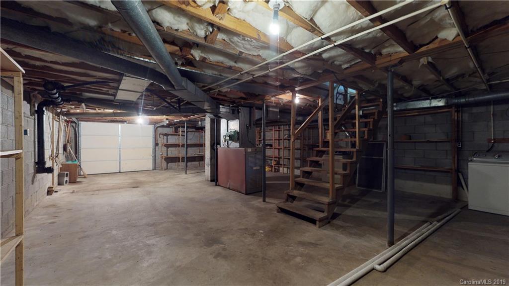 8617 Cruso Road Canton, NC 28716 - Photo 18 of 30 a view of empty room with wooden ceiling