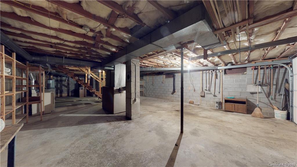 8617 Cruso Road Canton, NC 28716 - Photo 19 of 30 a view of a hall with wooden ceiling