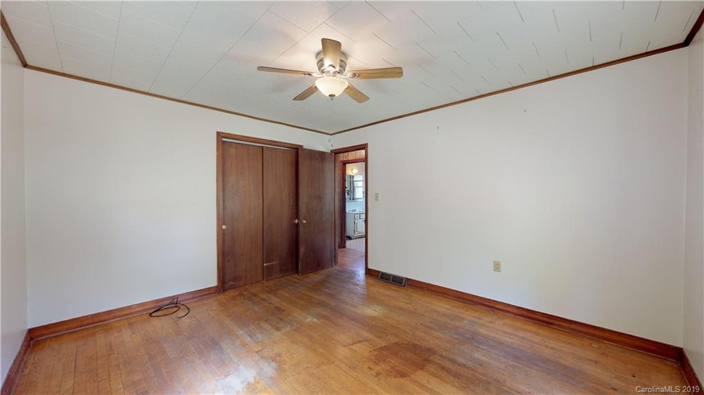 8617 Cruso Road Canton, NC 28716 - Photo 26 of 30 a view of a livingroom with a chandelier fan