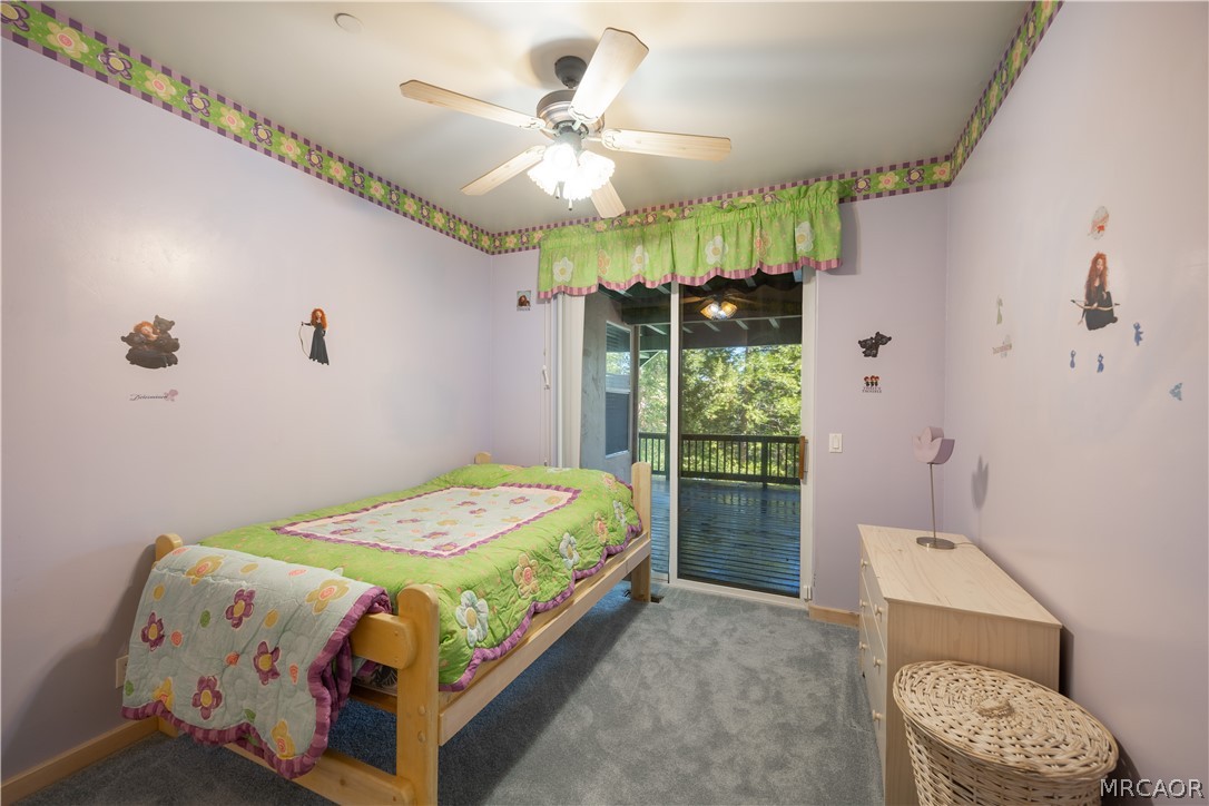 277 Grizzly Road Lake Arrowhead, CA 92352 - Photo 20 of 33 a bedroom with a bed and a window