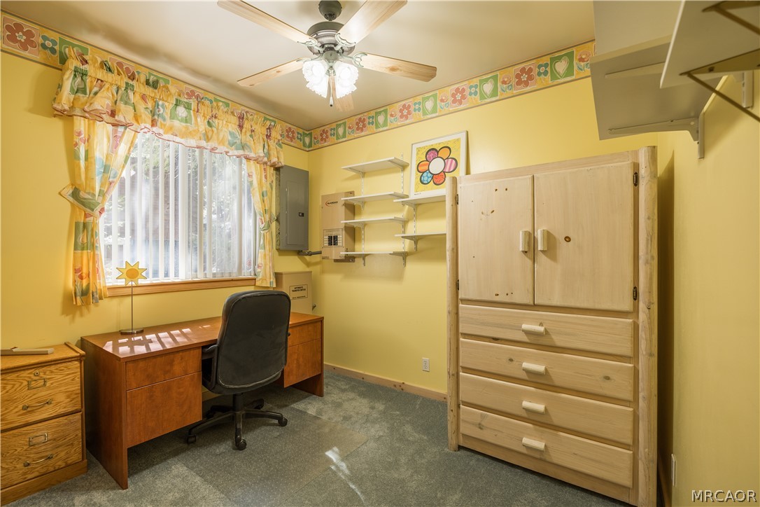 277 Grizzly Road Lake Arrowhead, CA 92352 - Photo 25 of 33 a bedroom with a bed and a chair