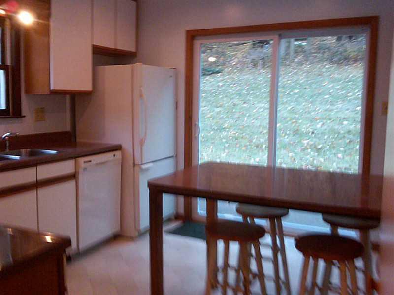 211 Weber Road Sewickley, PA 15143 - Photo 7 of 18 Kitchen. Beautiful view, lots of light, and easy access to patio and yard.