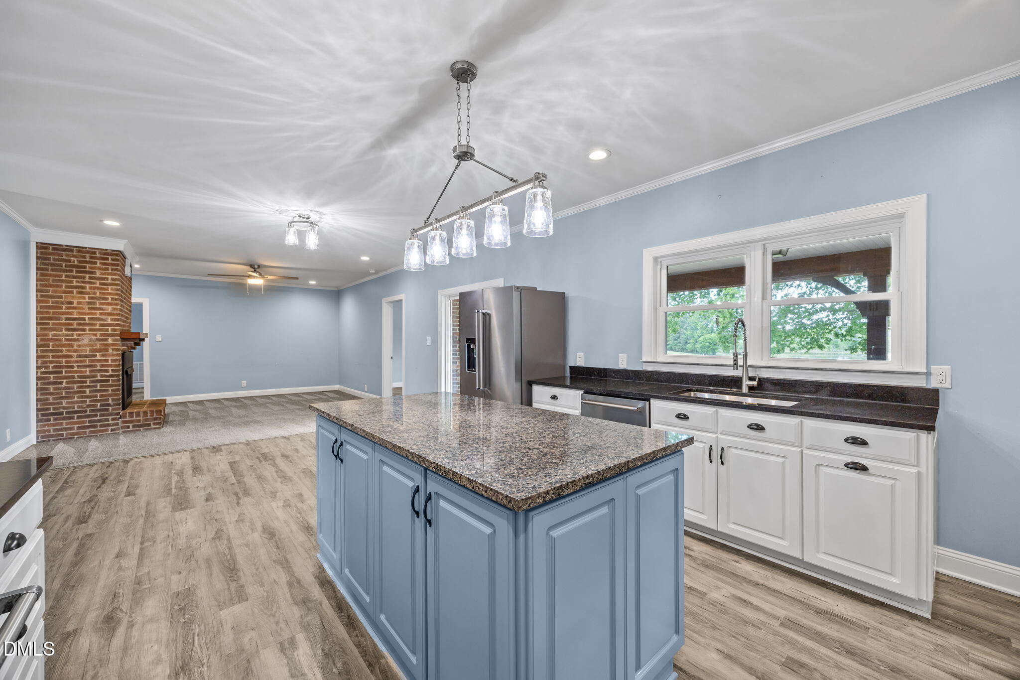 3611 Chewning Road Oxford, NC 27565 - Photo 33 of 45 a kitchen with granite countertop a sink and counter space