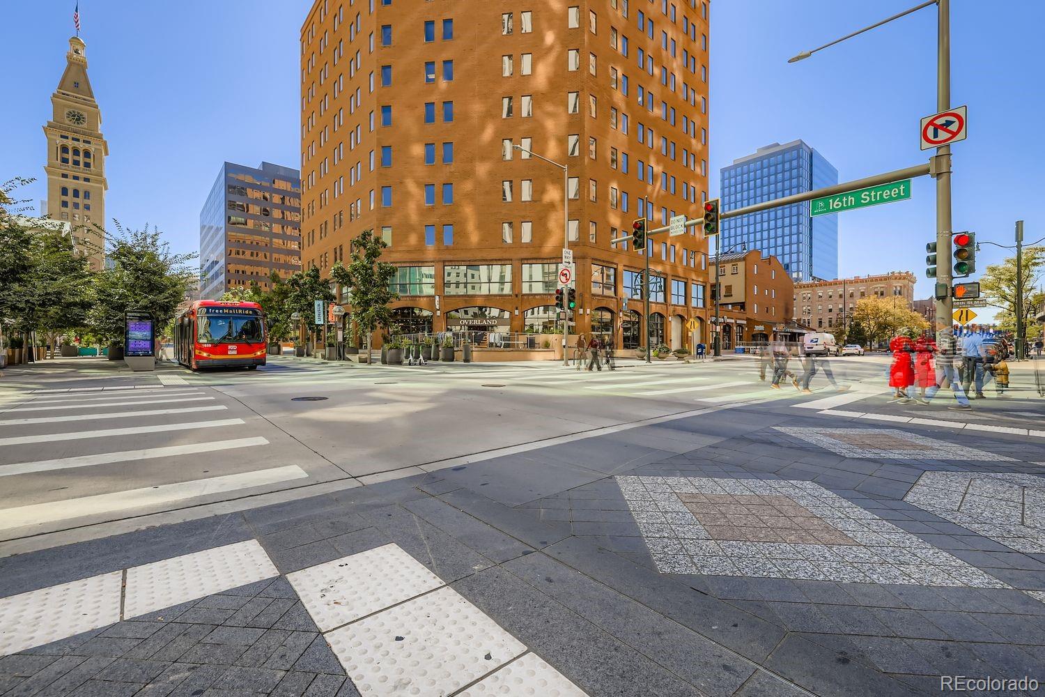1625 Larimer Street, Unit 1007 Denver, CO 80202 - Photo 26 of 28 a view of street with tall buildings