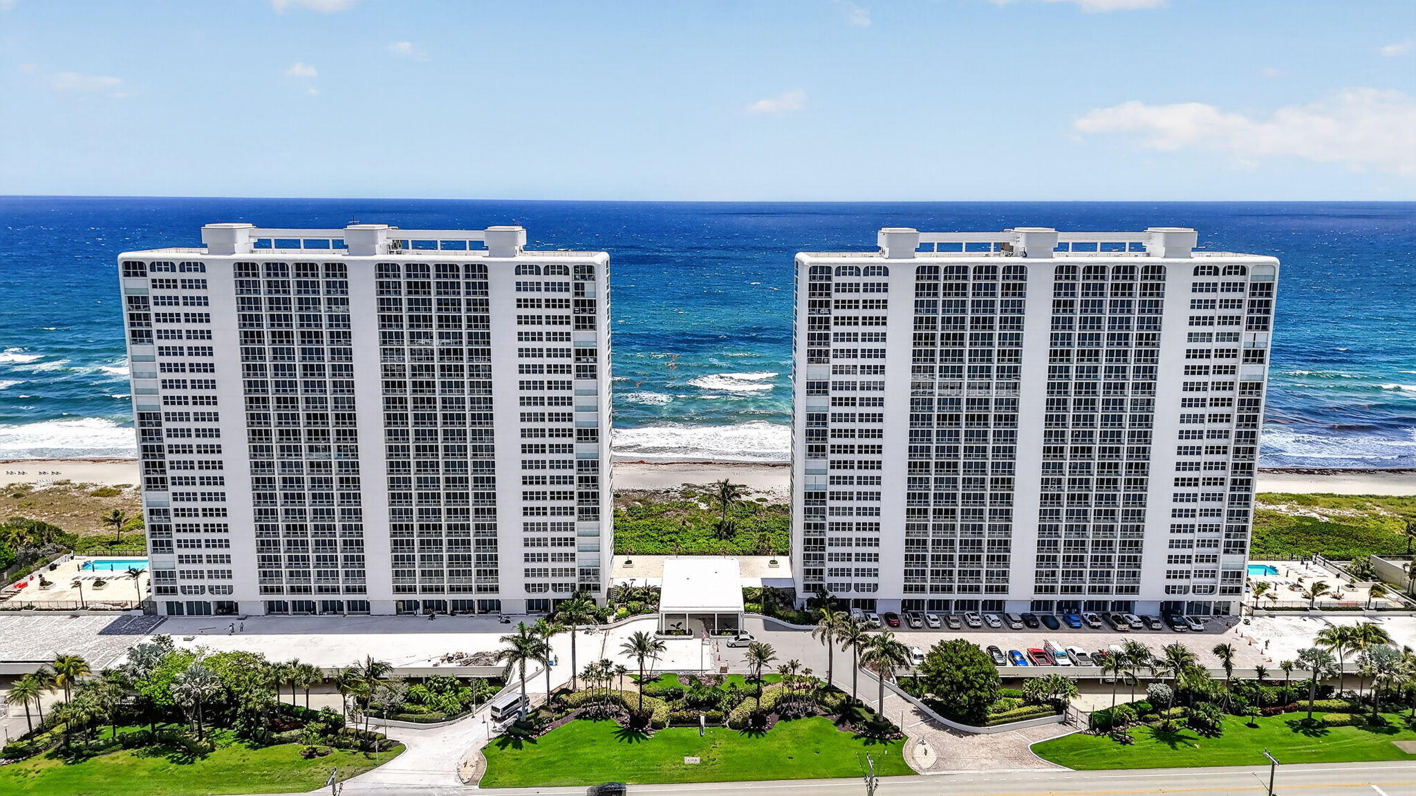 2800 South Ocean Boulevard, Unit 23C Boca Raton, FL 33432 - Photo 40 of 50 a front view of a building with a garden