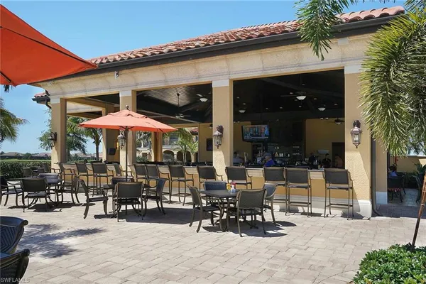an outdoor seating area with furniture