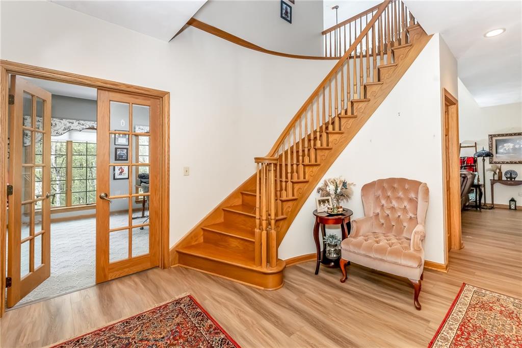 141 Timber Springs Drive Indiana, PA 15701 - Photo 23 of 50 a view of entryway and hall with wooden floor