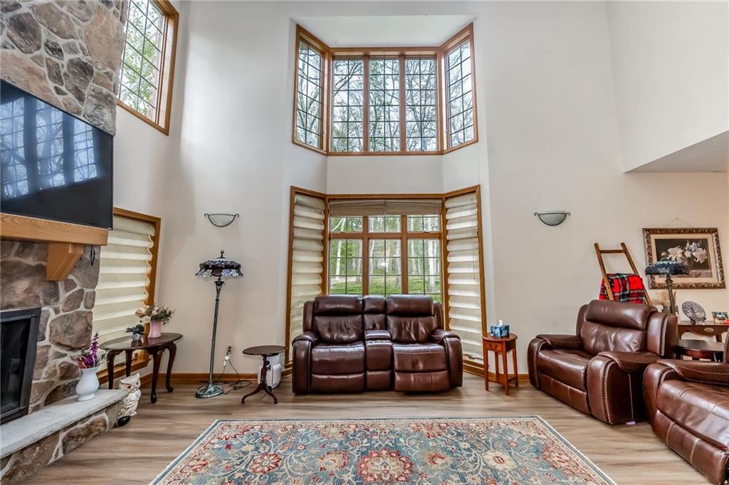 141 Timber Springs Drive Indiana, PA 15701 - Photo 26 of 50 a living room with furniture fireplace and a window