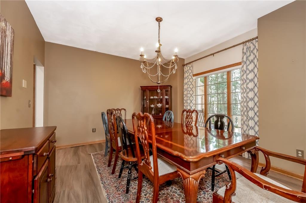 141 Timber Springs Drive Indiana, PA 15701 - Photo 33 of 50 a view of a dining room with furniture window and wooden floor