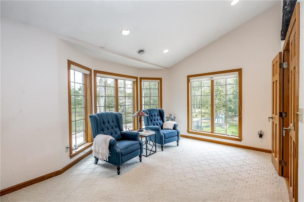 141 Timber Springs Drive Indiana, PA 15701 - Photo 38 of 50 a living room with furniture and large windows