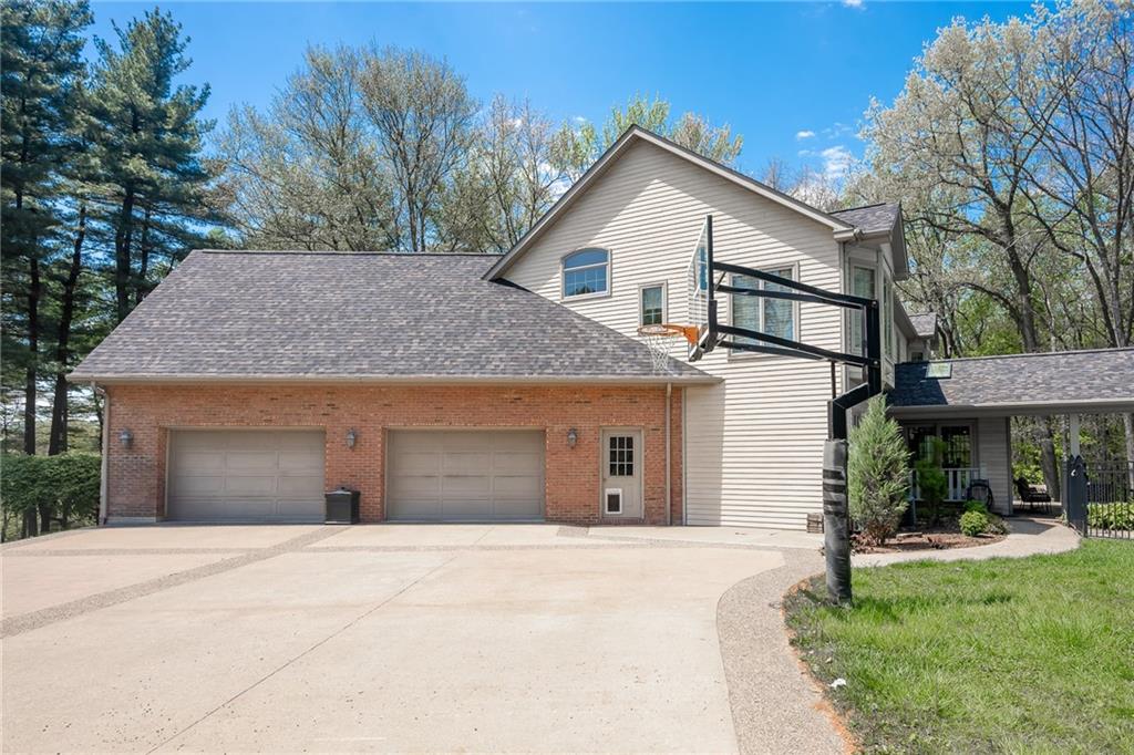 141 Timber Springs Drive Indiana, PA 15701 - Photo 10 of 50 a view of a house with a yard and large tree