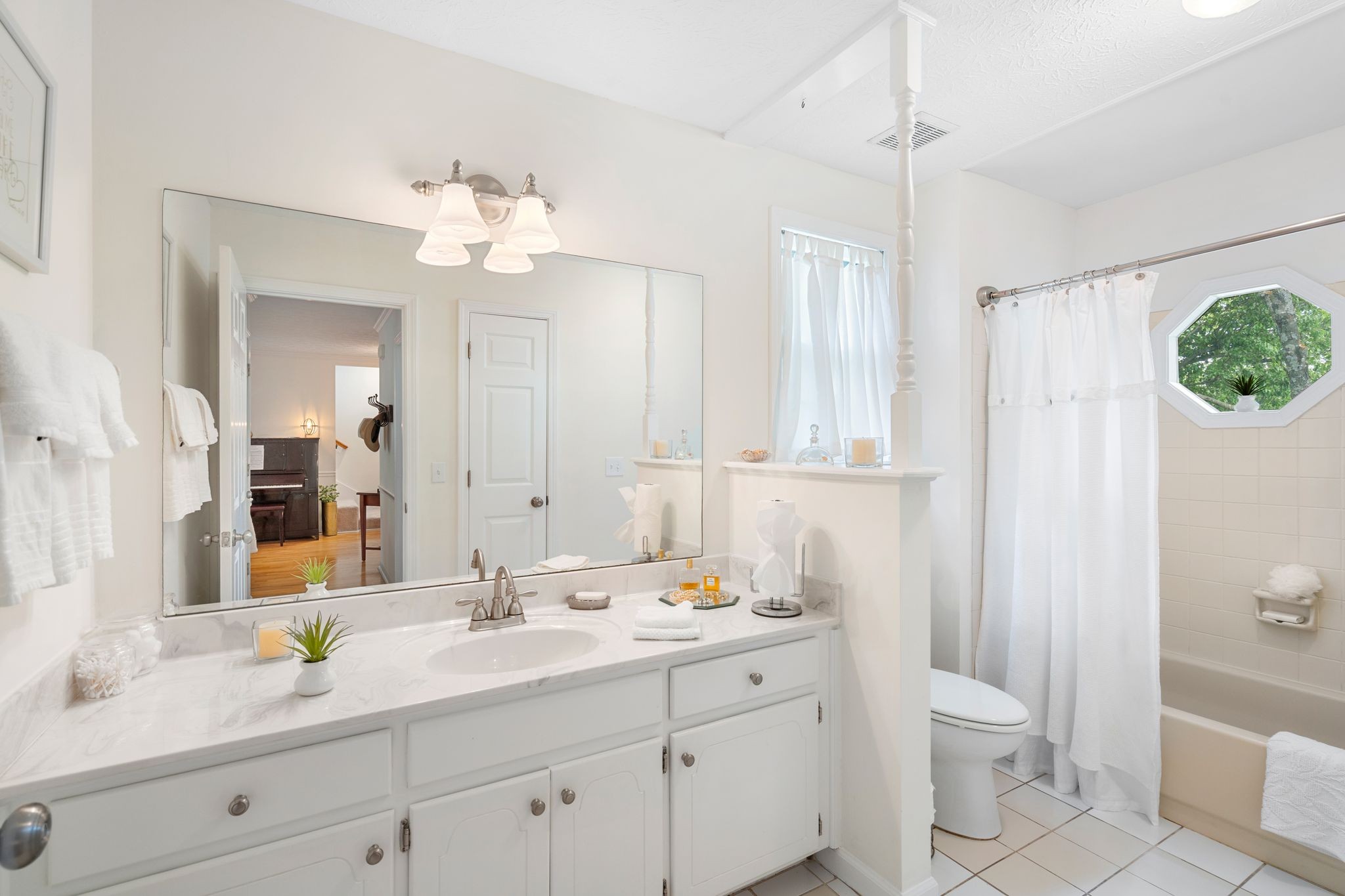 215 Devrow Court Franklin, TN 37064 - Photo 26 of 46 a bathroom with a double vanity sink mirror and toilet