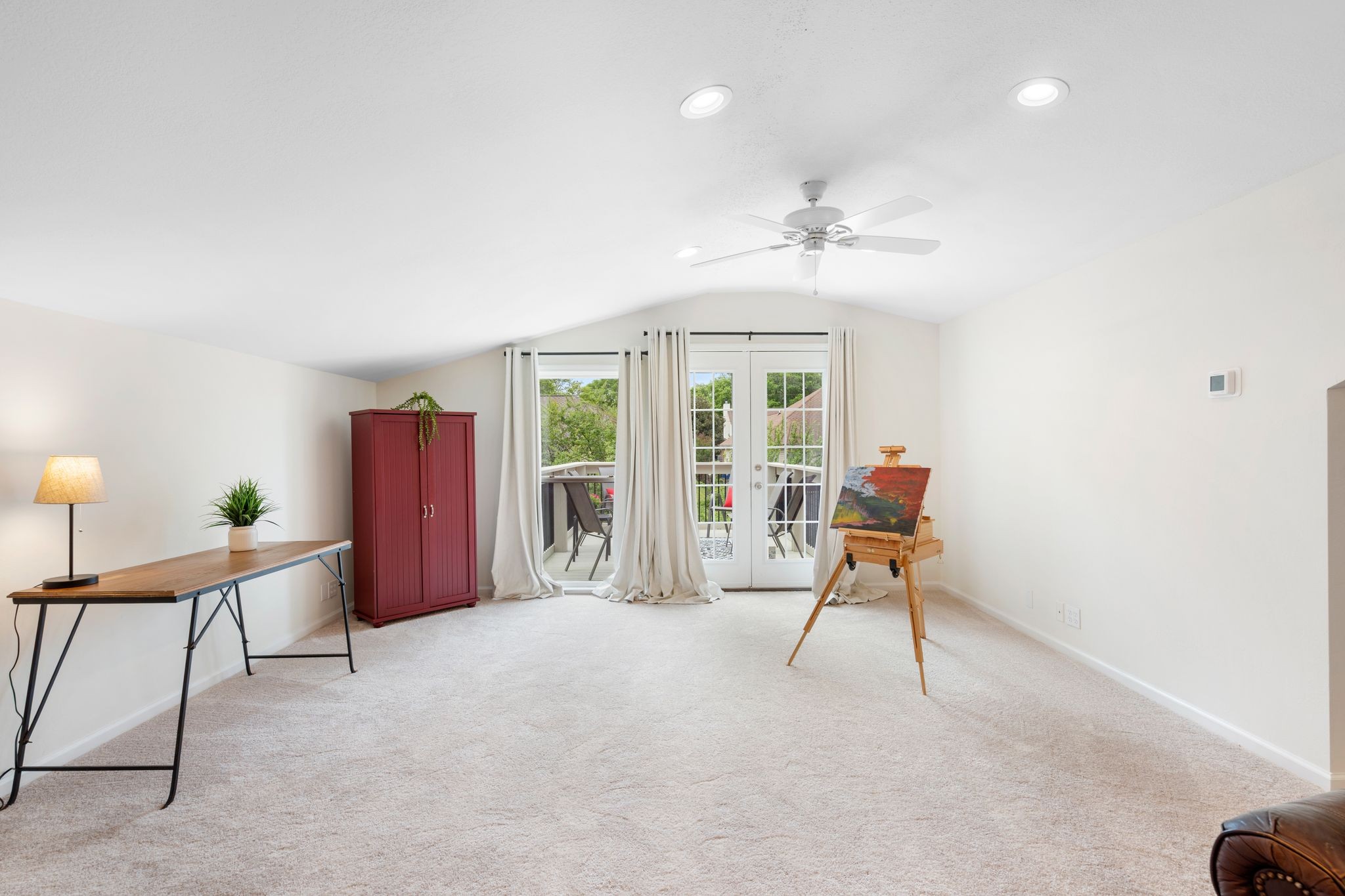 215 Devrow Court Franklin, TN 37064 - Photo 32 of 46 a living room with furniture a ceiling fan and a rug