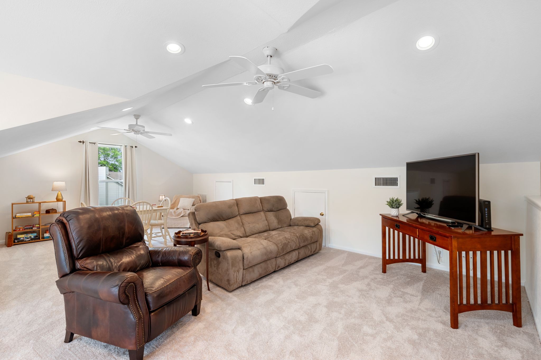 215 Devrow Court Franklin, TN 37064 - Photo 33 of 46 a living room with furniture and a flat screen tv
