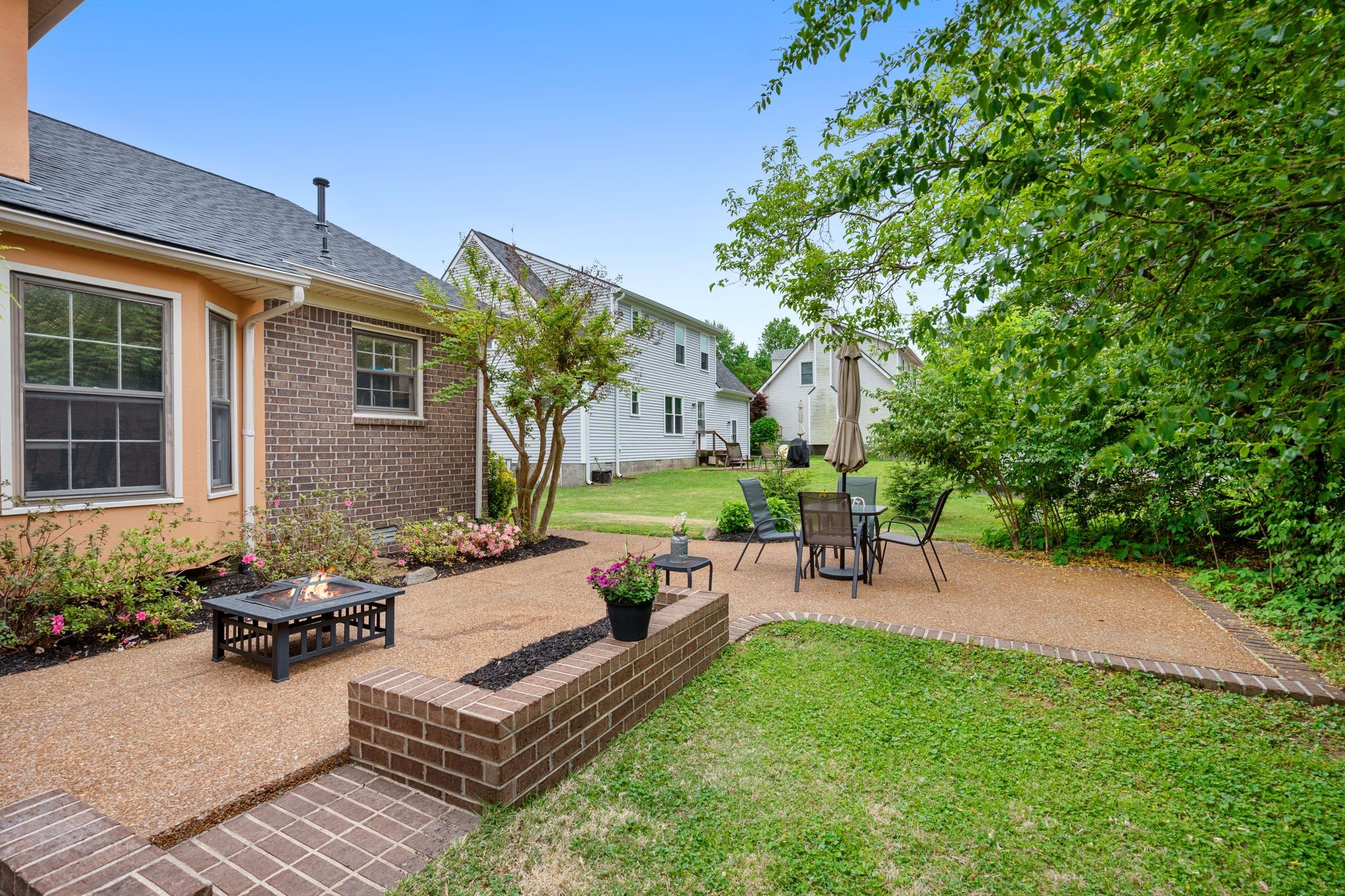 215 Devrow Court Franklin, TN 37064 - Photo 39 of 46 a view of a patio with couches table and chairs and potted plants