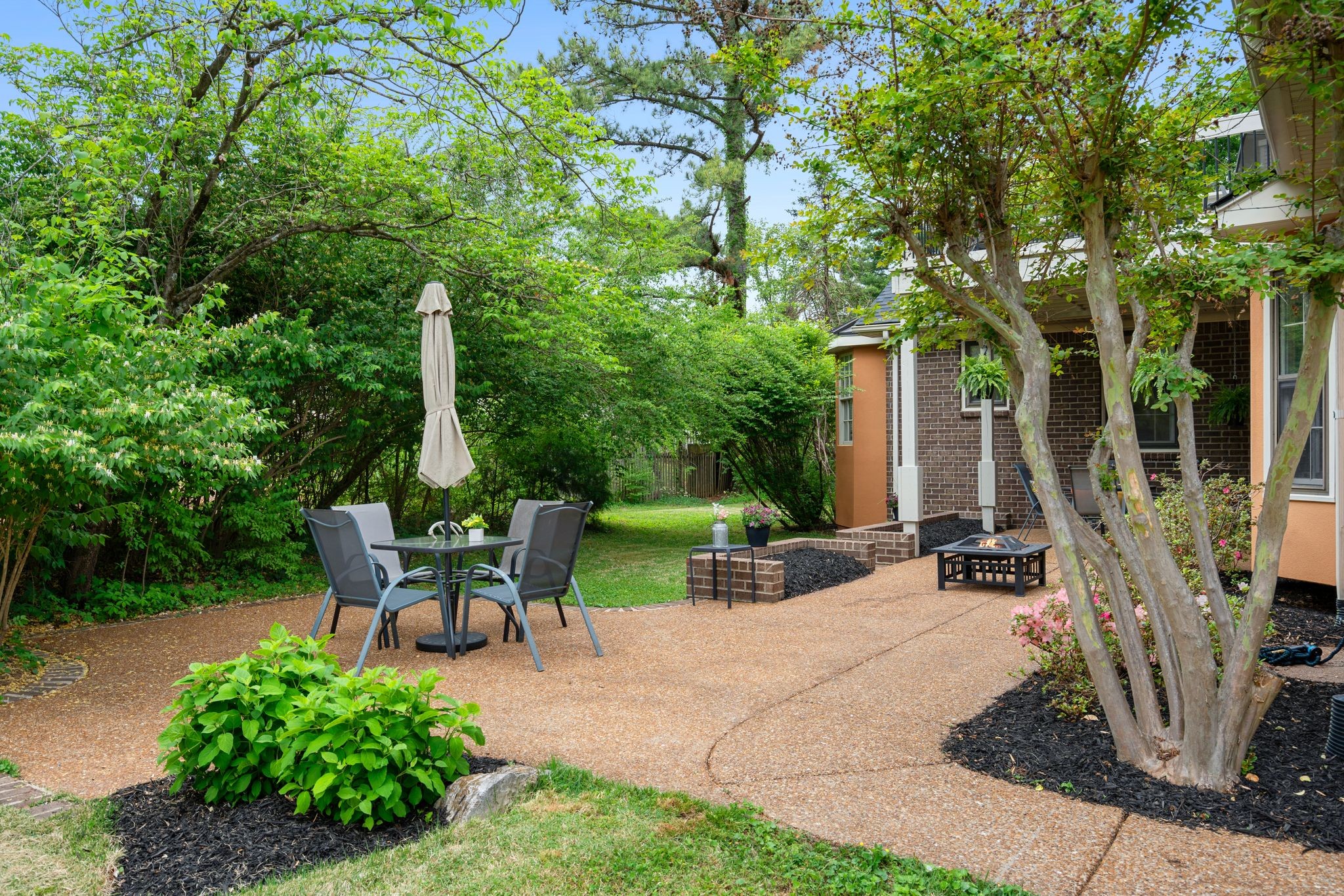 215 Devrow Court Franklin, TN 37064 - Photo 41 of 46 a view of backyard with patio area and outdoor seating