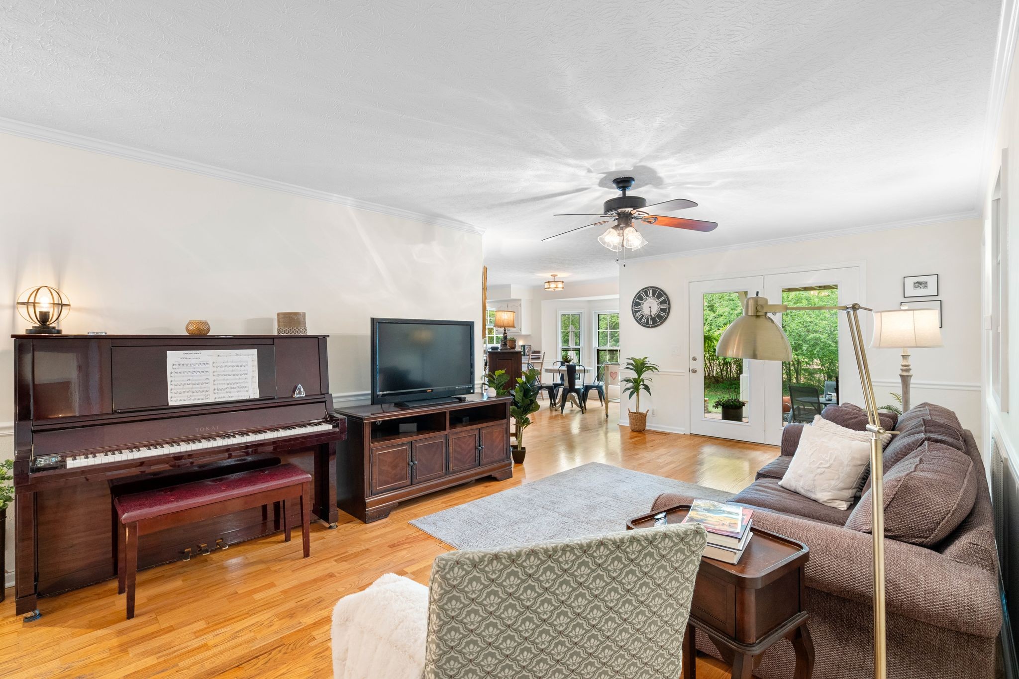 215 Devrow Court Franklin, TN 37064 - Photo 8 of 46 a living room with furniture and a flat screen tv