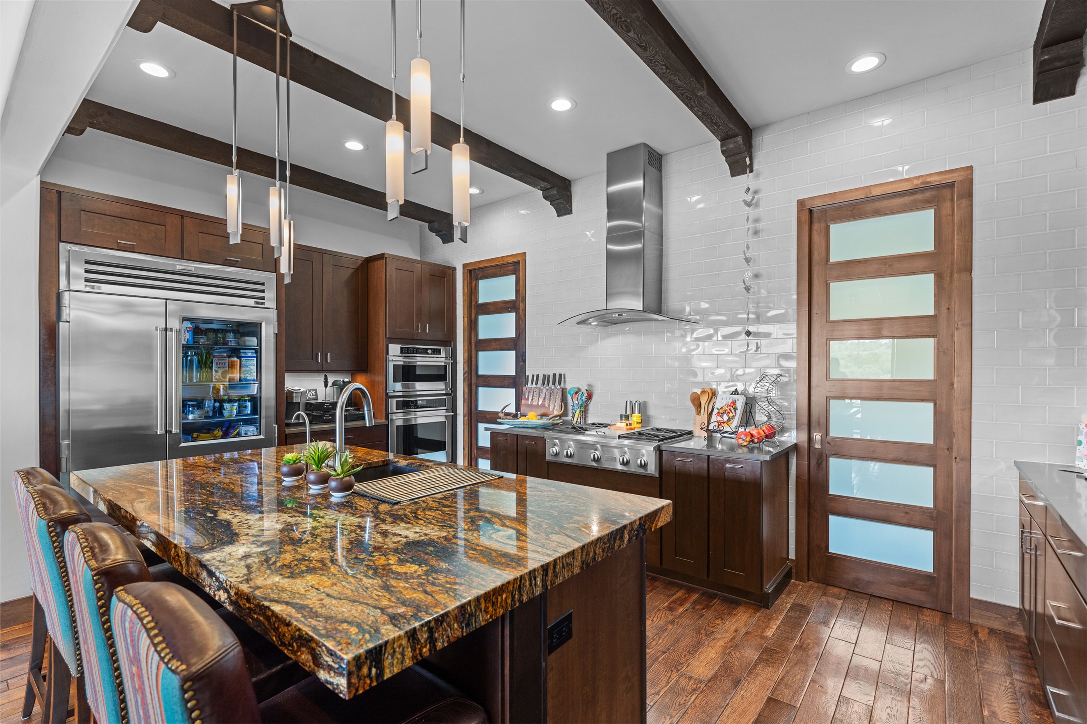 421 Rolling Hills Road Blanco, TX 78606 - Photo 12 of 40 Spacious kitchen with walk-in pantry and bar area.