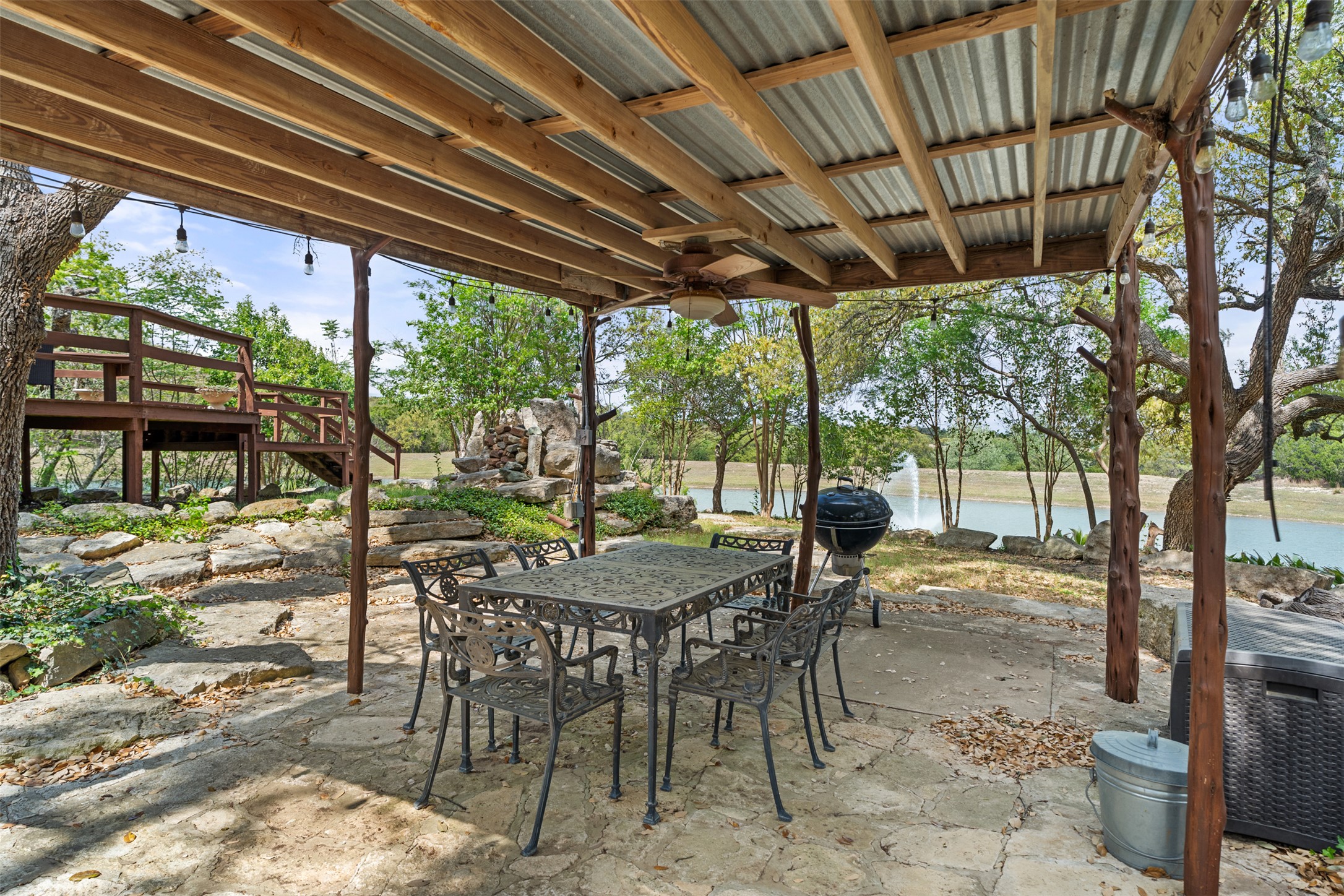 421 Rolling Hills Road Blanco, TX 78606 - Photo 29 of 40 Outdoor covered patio overlooking the lake.