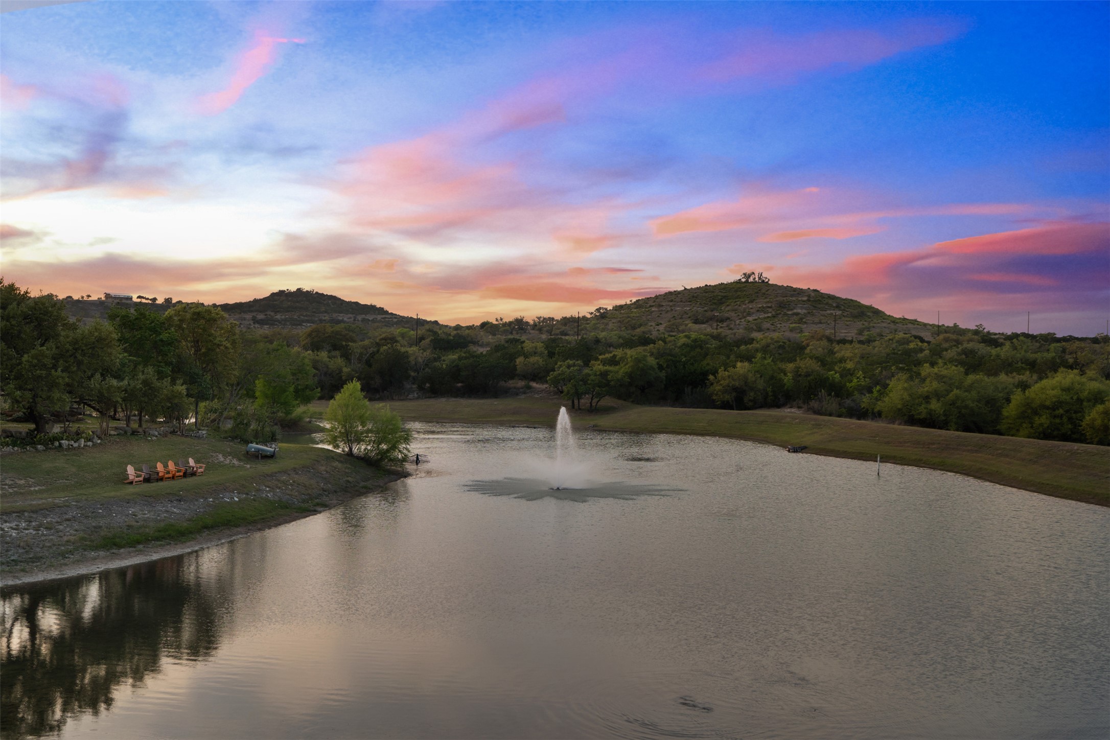 421 Rolling Hills Road Blanco, TX 78606 - Photo 8 of 40 Private 3 acre lake with central fountain.