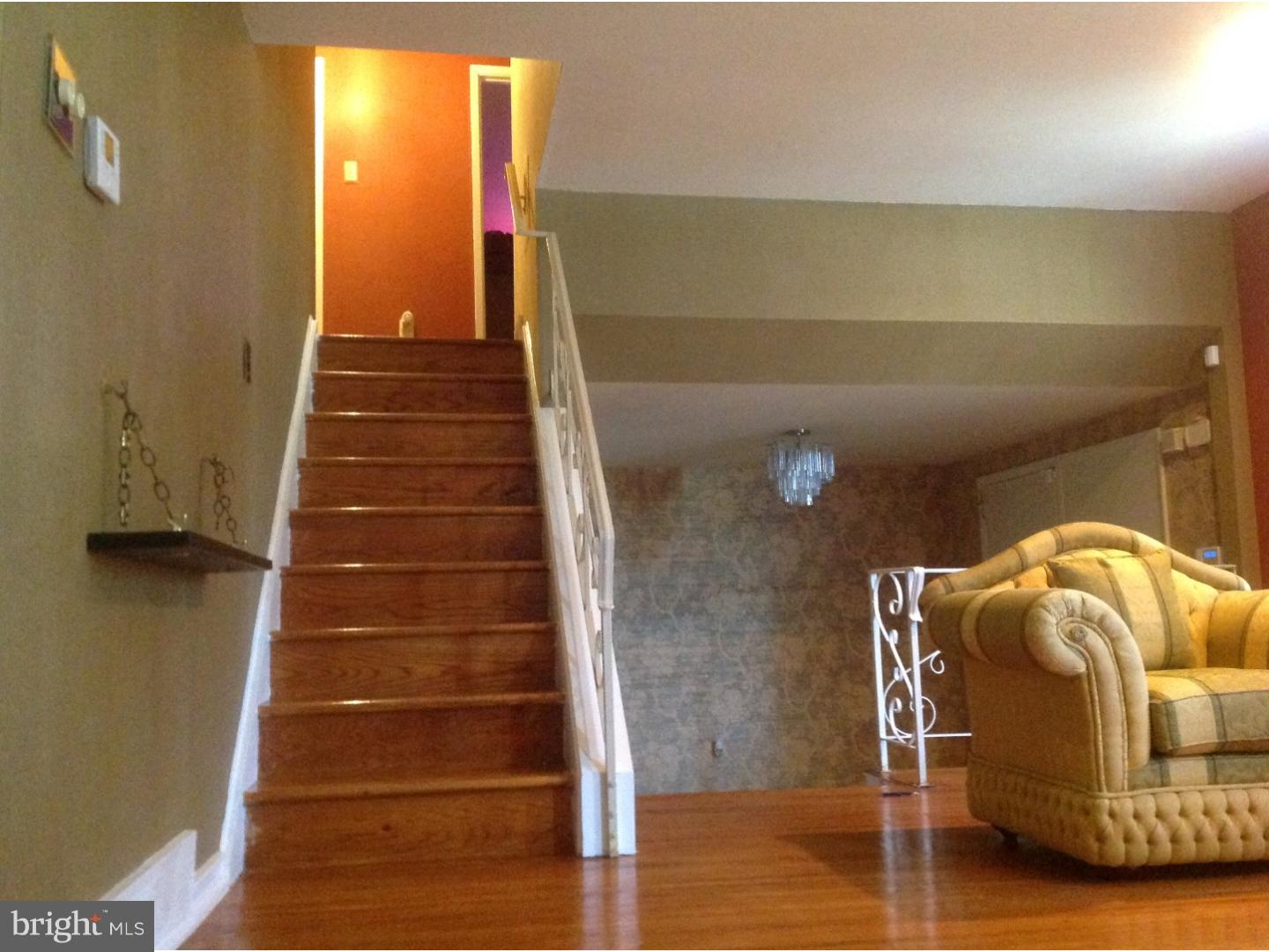 9708 Glenhope Road Philadelphia, PA 19115 - Photo 4 of 25 a view of entryway and hall with wooden floor