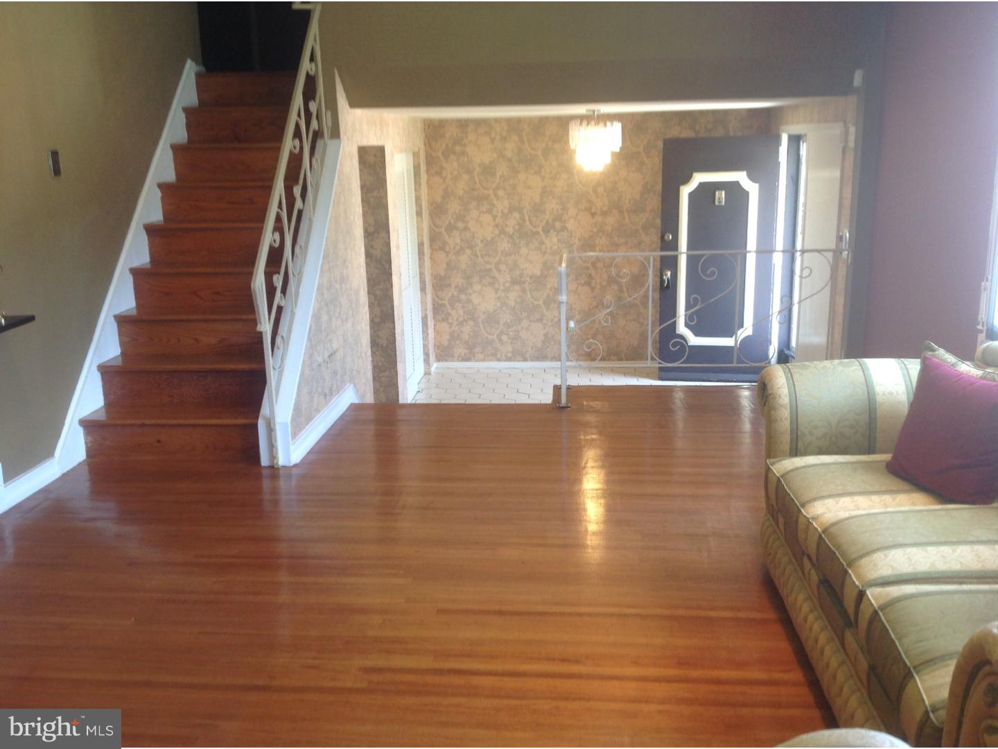 9708 Glenhope Road Philadelphia, PA 19115 - Photo 5 of 25 a living room with furniture and wooden floor
