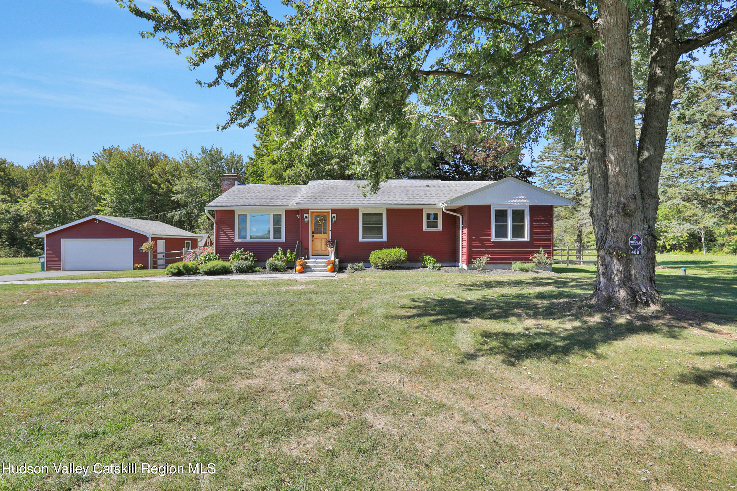 489 Forest Road Wallkill, NY 12589 - Photo 31 of 32 a front view of a house with garden
